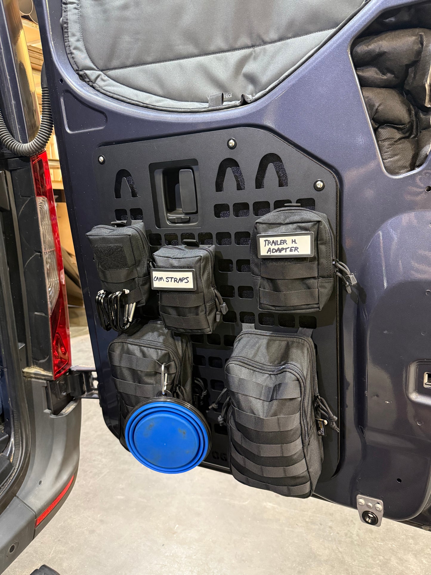 Mercedes Sprinter lower rear door MOLLE panel with storage pouches and accessories