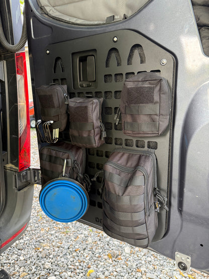 Mercedes Sprinter rear door MOLLE panel loaded with pouches and accessories